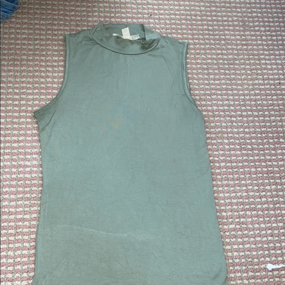 Fitted high neck green top